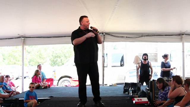 Scott Michael calls Tammy Harris on the phone during his show at Elvis Week 2015