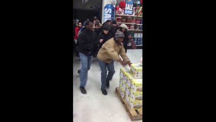 Lady steals from KID in USA on black friday 2015