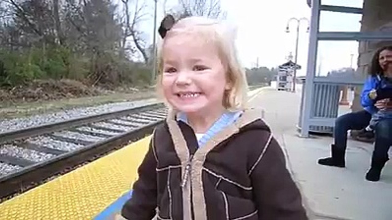 This little girl sees a train for the first time and it is too adorable! funny video