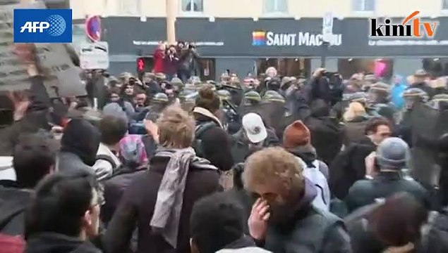 Paris police detain 208 after climate change demo