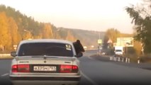 Meanwhile In Russia a Grizzly Bear Rides In The Back Seat