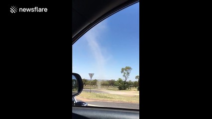 Whirlwind blows along Australia road