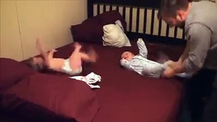This is what it's like to get twin babies dressed
