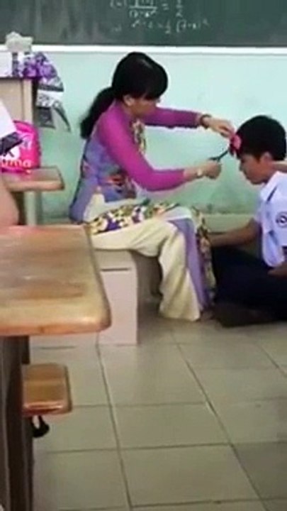What is teacher Doing with Student,,,,,,WATCH