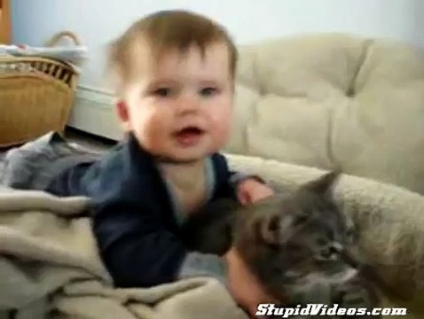 Baby Playing with cat and says Allah Allah isn't it