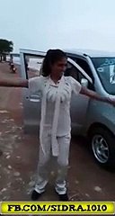 A woman Doing Dance in a Public Place in Karachi with wazir e sahil