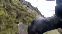 Biker survives 40ft fall after high speed near miss