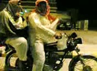 Two Mens Fall down from Bike While Performing a Stunt.