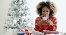 Young African Woman Checking For Xmas Messages | Stock Footage - Videohive