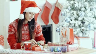 Young Woman Making a Christmas Greeting Call | Stock Footage - Videohive