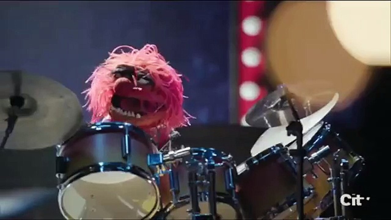 Dave Grohl fait un duel de batterie avec un muppet