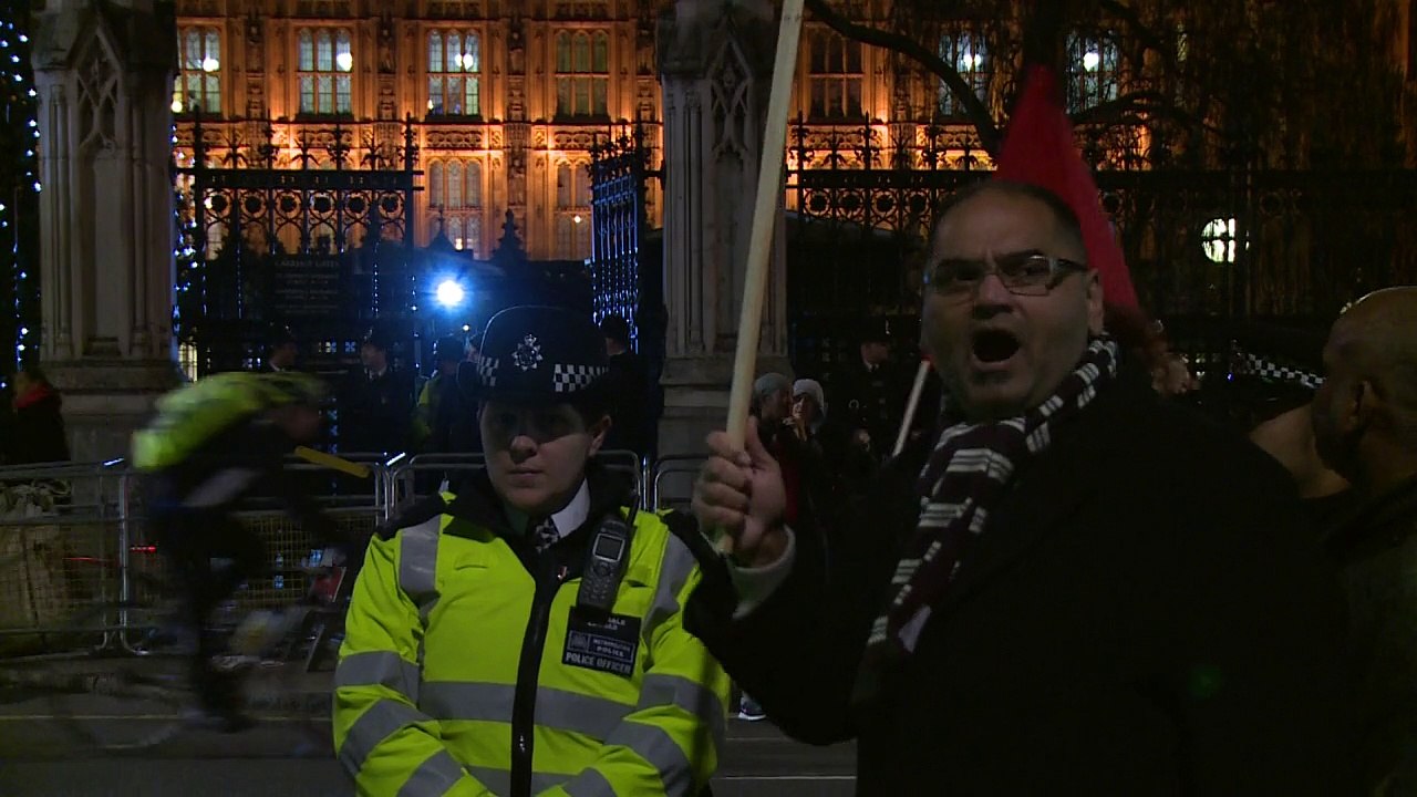 'Die-in' protest as British parliament votes on Syria strikes