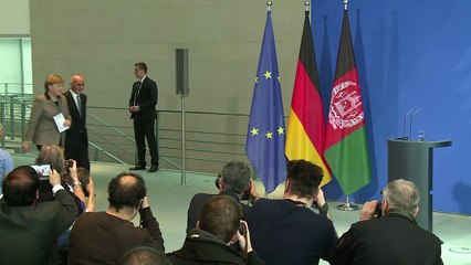 German, Afghan leaders pledge to reduce migrant flows