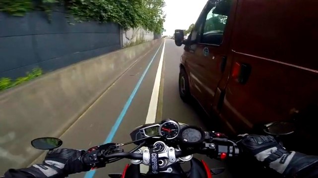 Motorcyclist Gets Pissed After Almost Getting Crushed By Merging Van