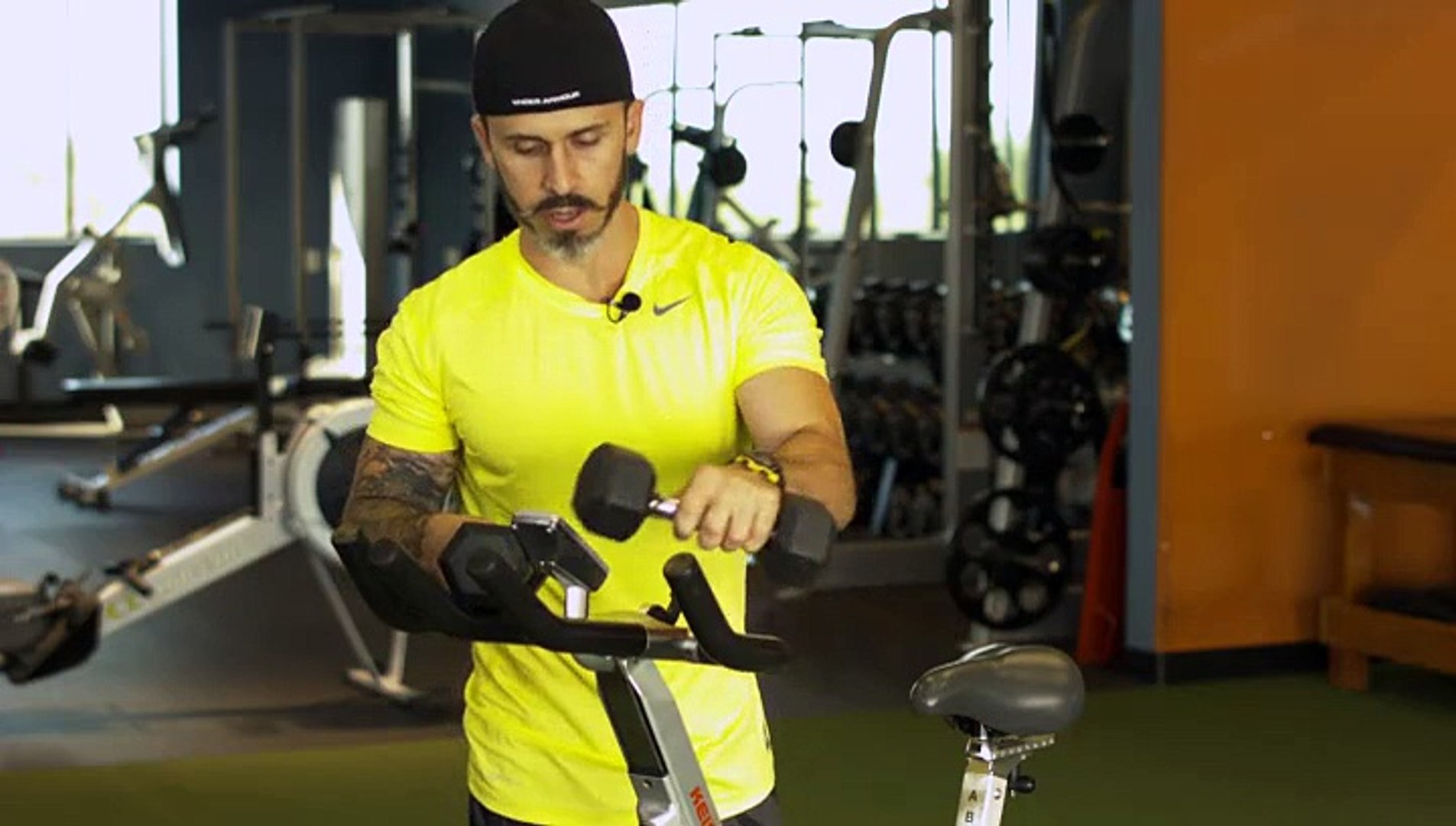 ⁣How to Use Free Weights While Riding an Exercise Bike