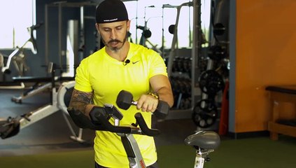 How to Use Free Weights While Riding an Exercise Bike