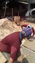 Angry worker throws cell phone into concere mixer