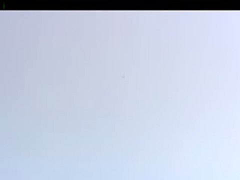 Stuntman skydives onto a hay bale target without a parachute