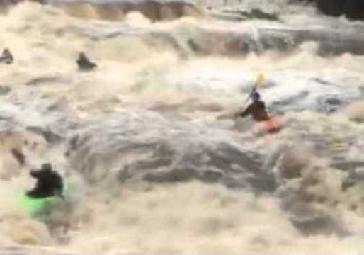 Kayakers Take Advantage of Storm Desmond Flooding in Ennistymon