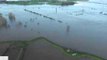 Footage Shows Large Buildings Submerged in Cumbria Floods
