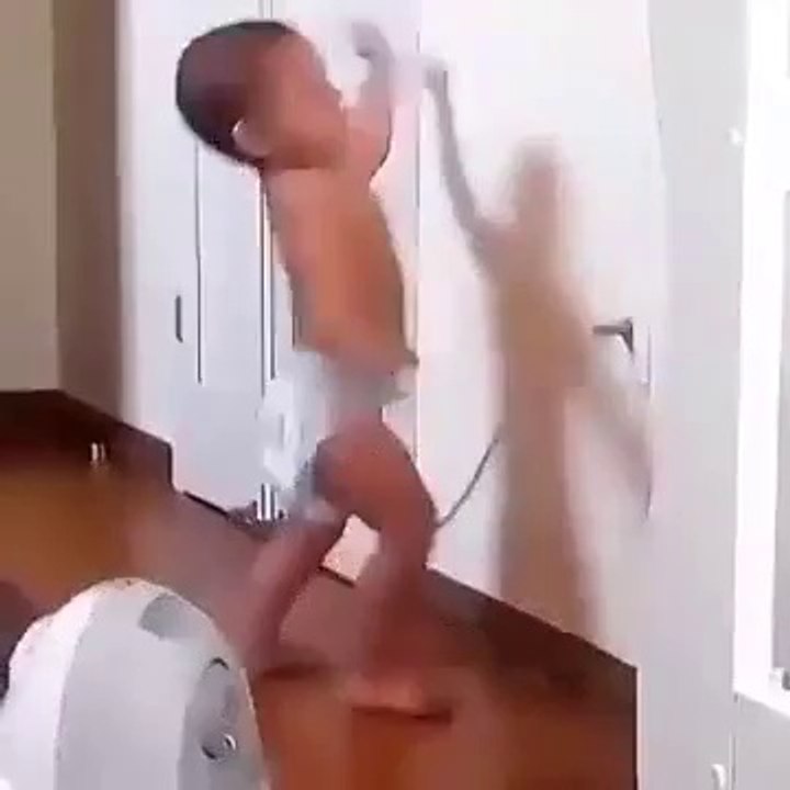 cute kid playing with cleaner