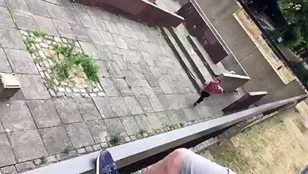 boy jumping over the wall
