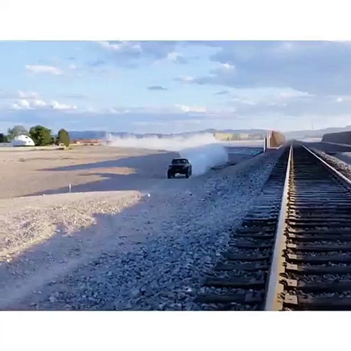 Clip of Lindsey Pelas Off-Roading in a Bikini Top!