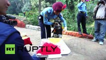 Nepal: Police officers show their love for dogs in Tihar celebrations