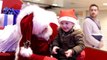 Santa Signs to Child While Mom Watches & Her Reaction is Priceless!