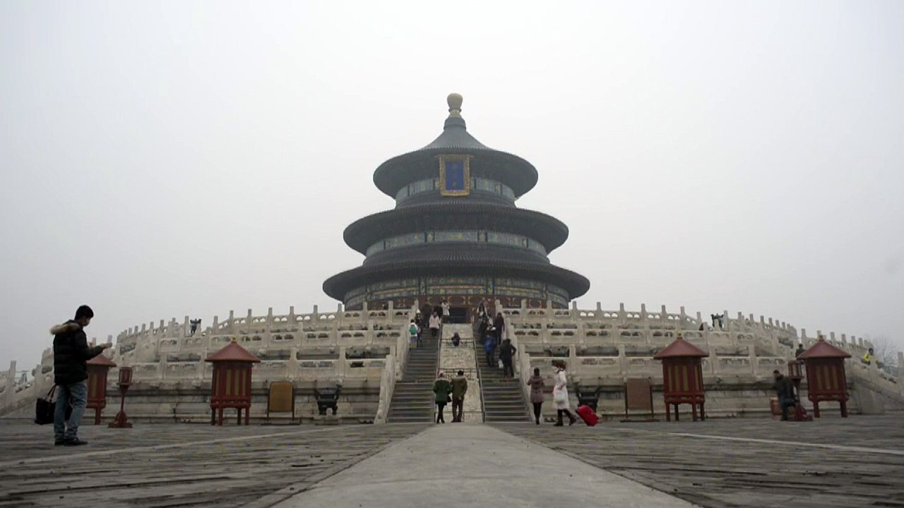Chine: noyés sous la pollution, les Pékinois te...
