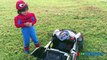 SUPERHEROES BATTLE POWER WHEELS RACE Ride On Car for kids Batman vs Spiderman Egg Surprise