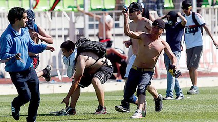 Chilean League Game Abandoned After Fans Fight on Pitch