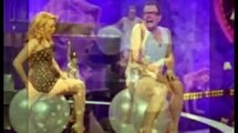 Kylie Minogue demonstrates her sexercise skills to Alan Carr