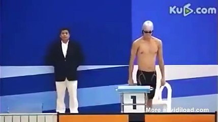 The swimmers jumps in pool