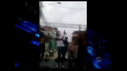 Homem atira para o alto durante show de pagode no Rio de Janeiro