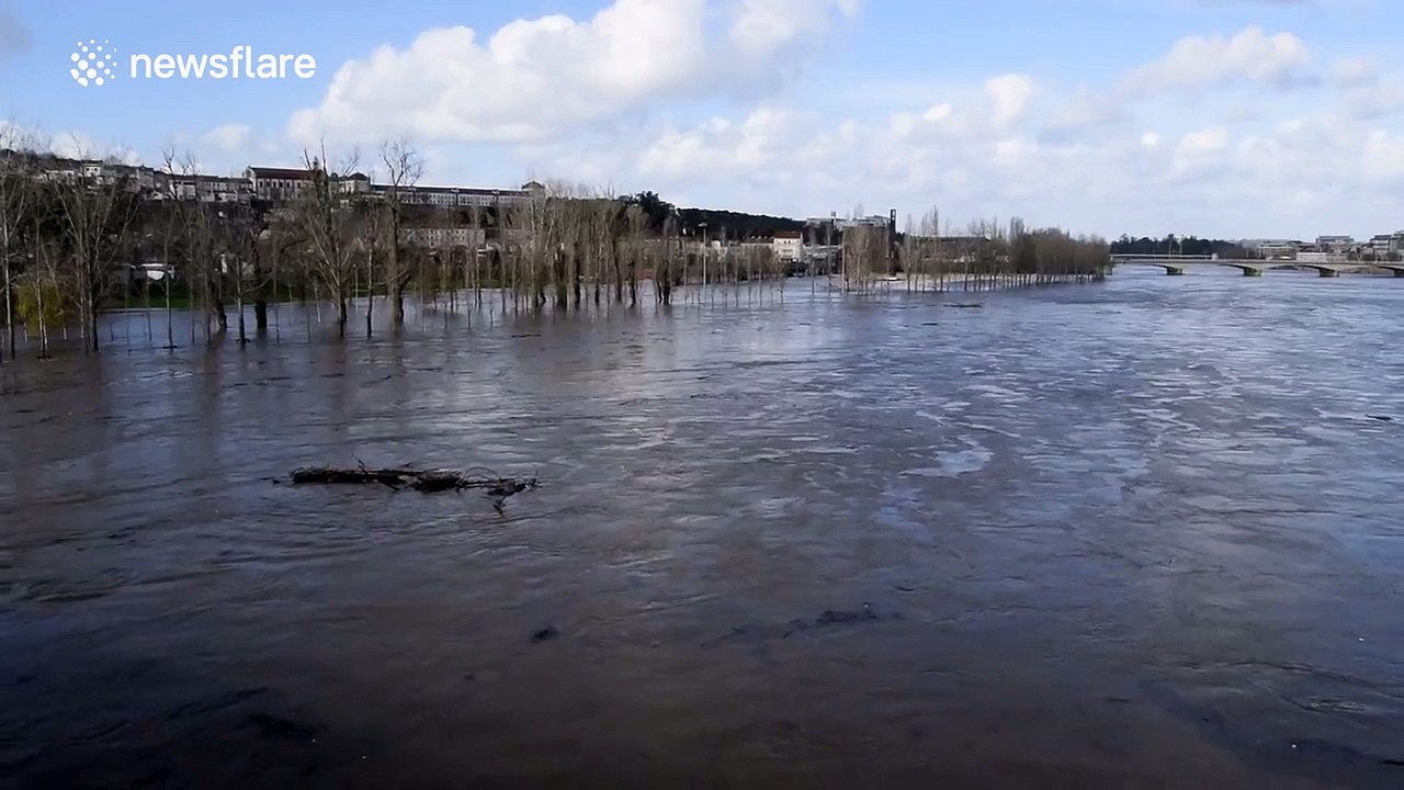 Portugal river bursts banks and floods area