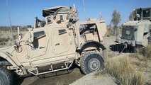US Marines Tow Truck Recovering MRAP and Logistic Truck Stuck in the Mud