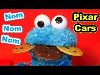 Download Video: Cookie Monster Count and Crunch eats Pixar Cars Micro Drifters Lightning McQueen, Sally and Mater wi