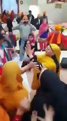 Bibiya fighting Turlock gurdwara