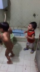 Two Kids Taking a Bath And Dance