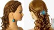 Romantic braided prom hairstyle for long hair.