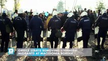 Greece starts removing stranded migrants at Macedonia border
