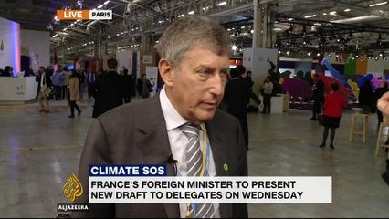 World leaders in Paris woirking to seal a climate deal