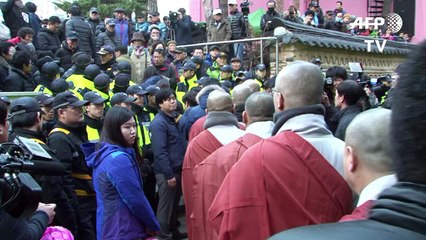 S. Korea police set to storm Buddhist temple for wanted activist