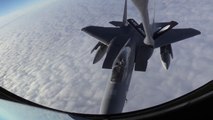 F-15 Aerial Refueling Above the Clouds