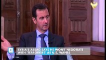 Syria's Assad says he won't negotiate with 'terrorists' as U.S. wants