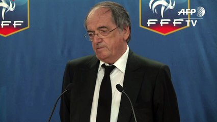 France suspends footballer Benzema over sex-tape scandal