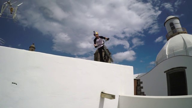 Danny MacAskill rides roofs with his BMX in Gran Canaria, Spain