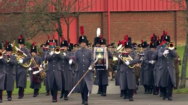 William presents medals to Ebola medics
