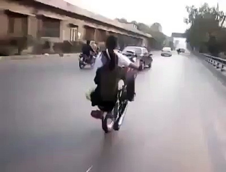 Desi Boy Wheeling with Girl Friend Sitting Back